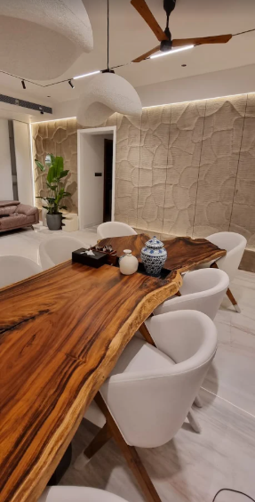 Live-edge solid wood dining table crafted by Bhumi Decor