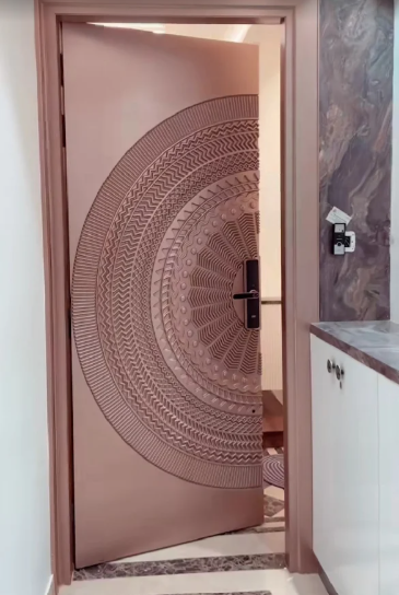 Custom carved entrance door in blush finish by Bhumi Decor